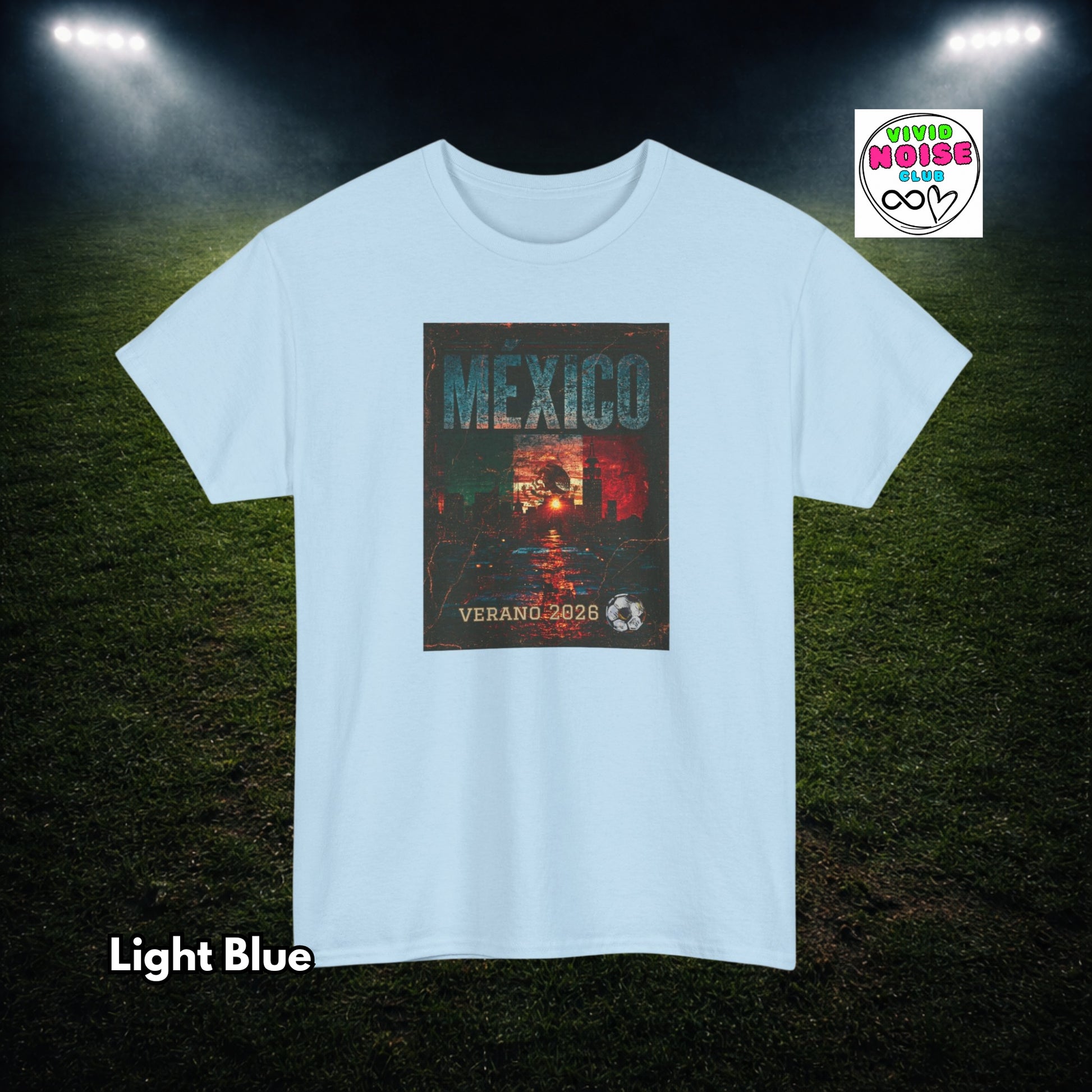 Light blue t-shirt with a graphic design on a dark background