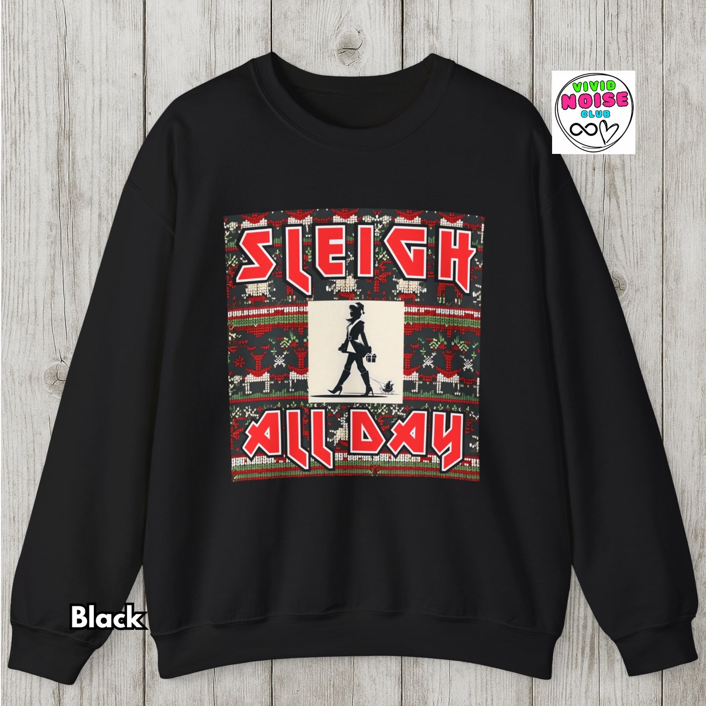 Black sweatshirt with 'Sleigh All Day' graphic on a wooden surface, featuring the Viva La Noise brand.