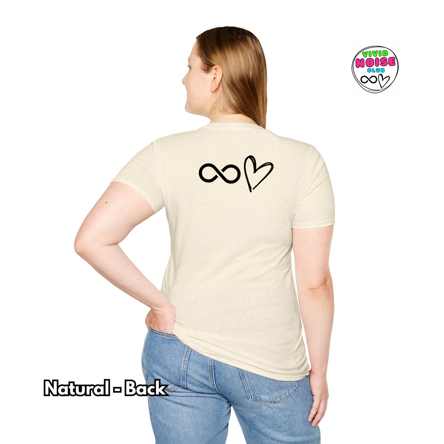 Person wearing a beige t-shirt with a symbol on the back, standing against a white background.