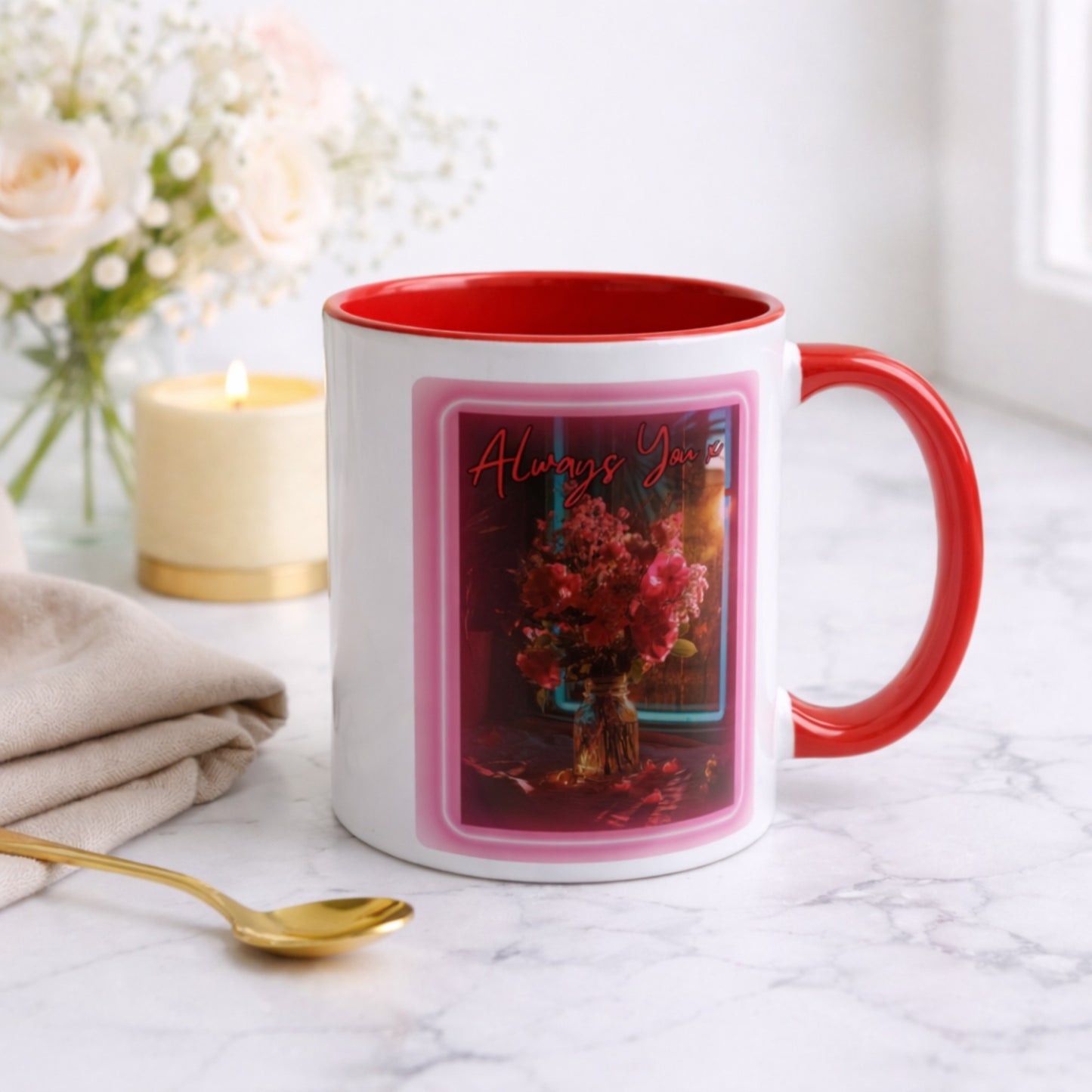 Mug with red interior and handle, featuring a floral design and 'Always You' text on a marble surface.