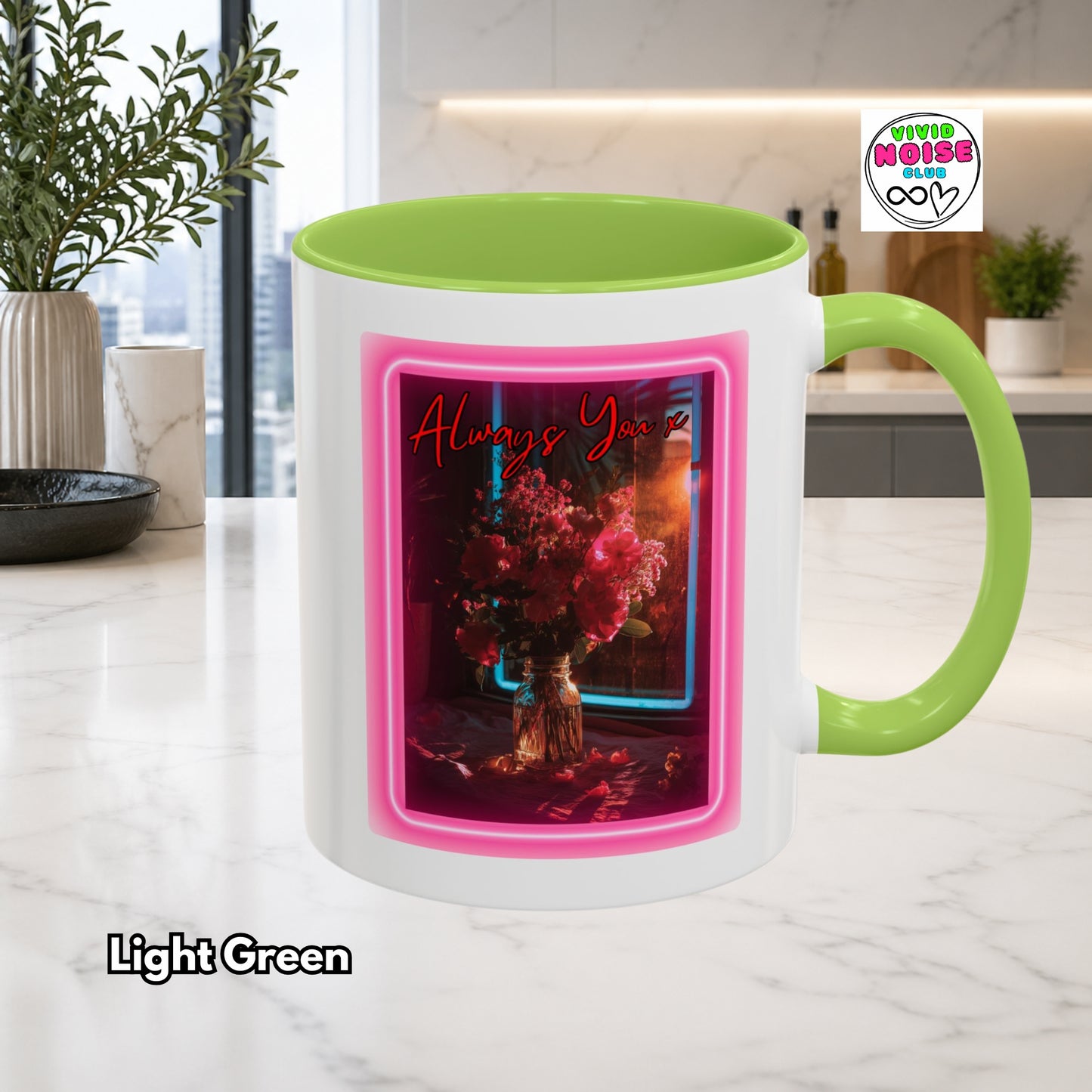 Mug with light green handle and interior a floral design and 'Always You' text in a kitchen setting