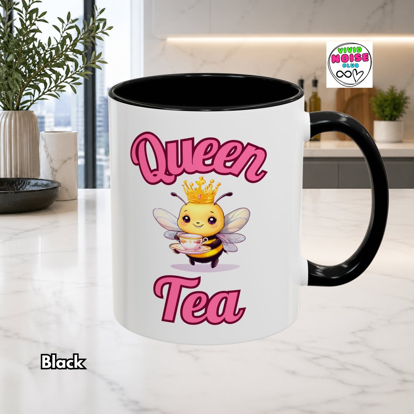 Mug with a bee design and 'Queen Tea' text in a kitchen setting