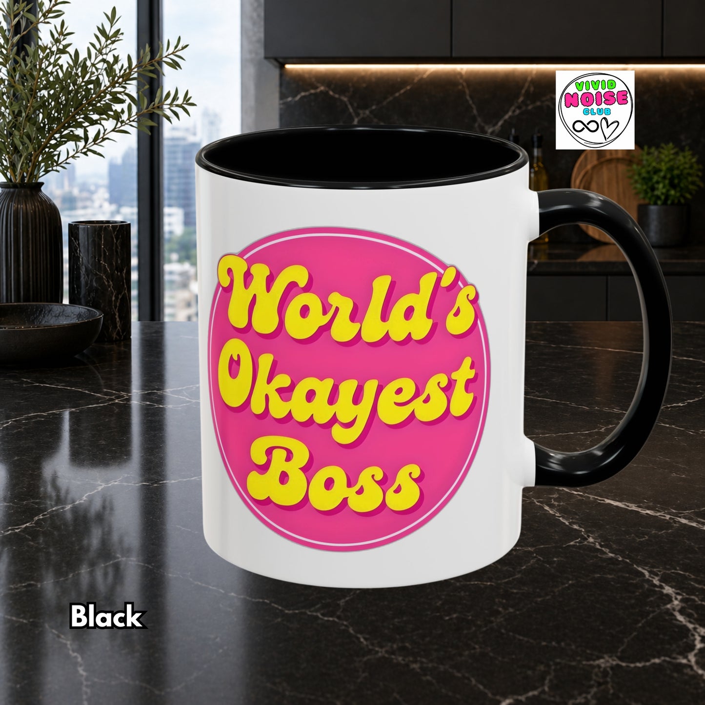 Mug with 'World's Okayest Boss' text on a marble surface