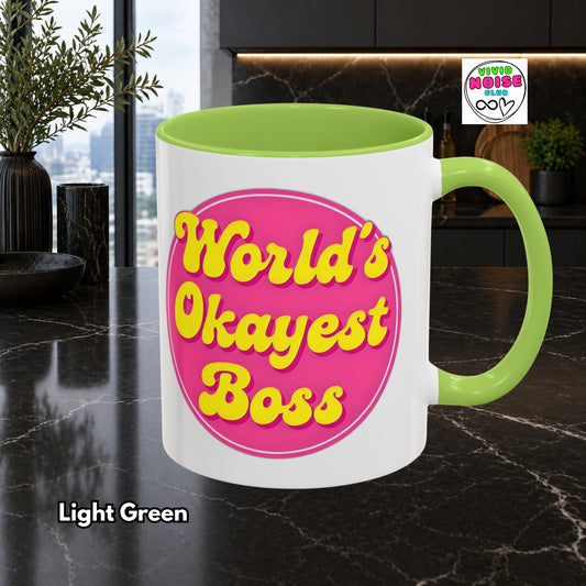 Mug with 'World's Okayest Boss' text on a marble surface