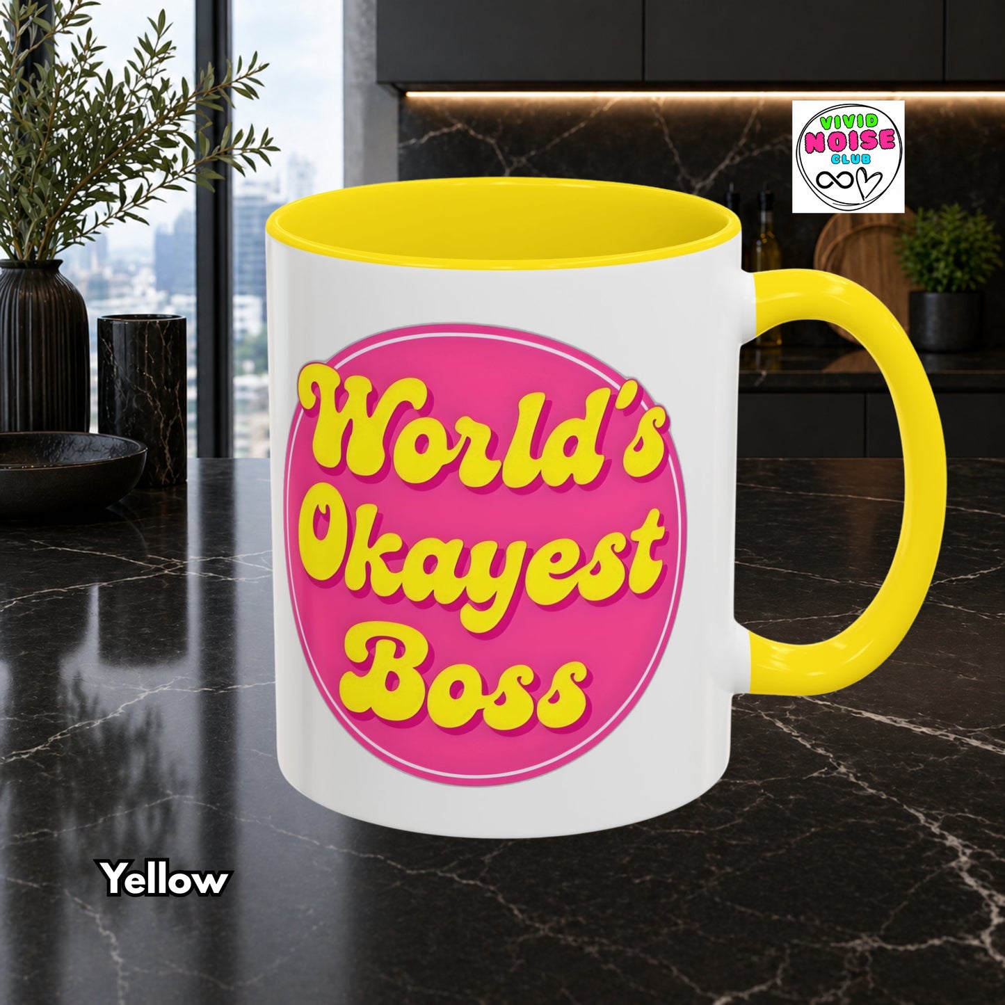 Mug with 'World's Okayest Boss' text on a marble surface