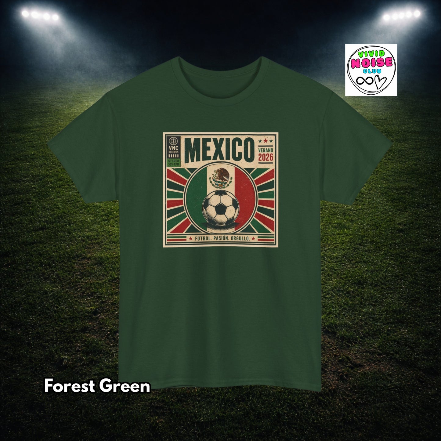Green t-shirt with soccer design and 'Mexico' text on a grass field background