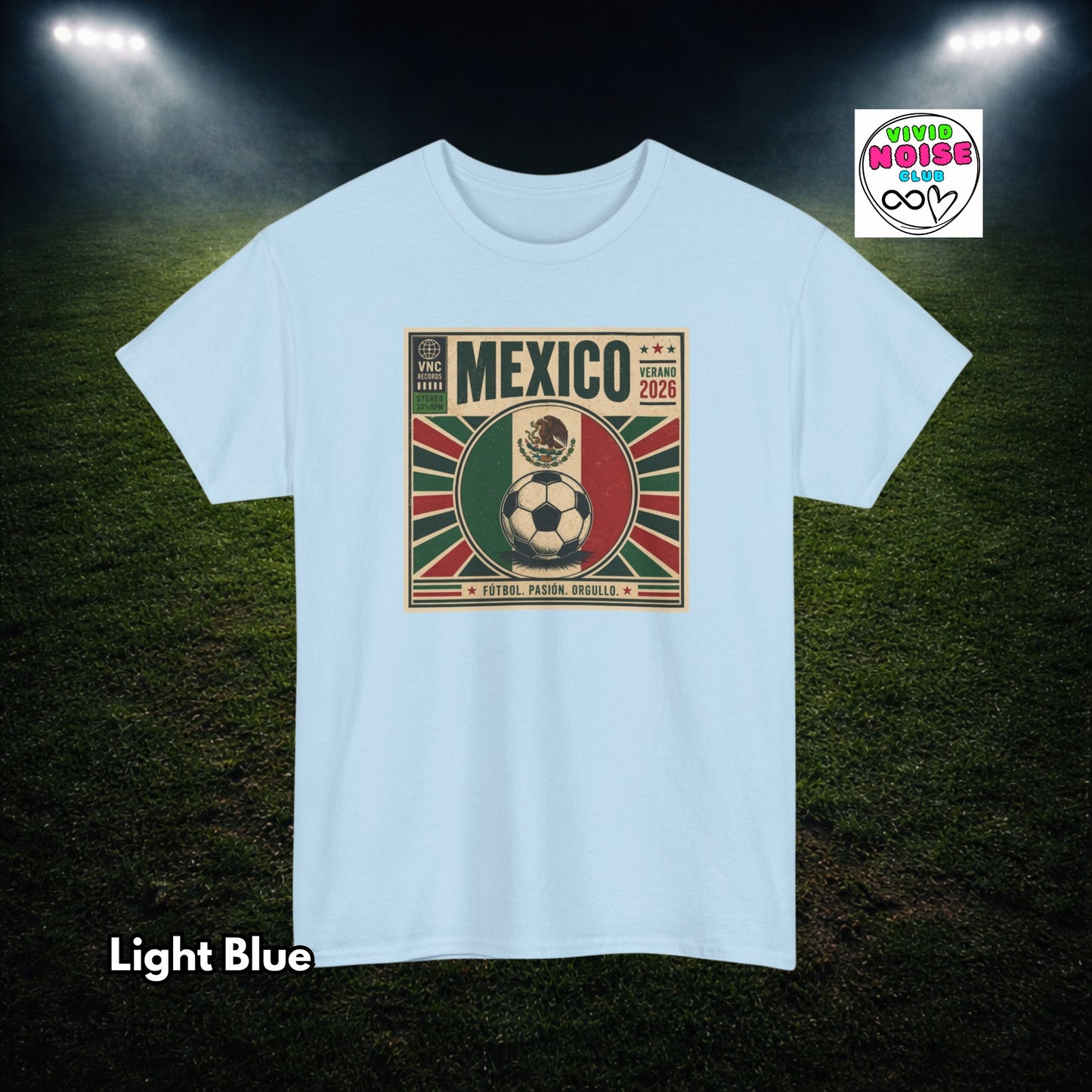 Light blue t-shirt with Mexico soccer design on a grass field background
