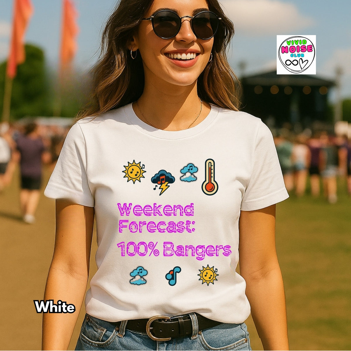 A woman wearing a white graphic T-shirt with weather icons and the text 'Weekend Forecast: 100% Bangers' in pink and purple, photographed outdoors at what looks like a festival. A 'Summer Noise' brand logo appears in the top right, and 'White' is labeled in the bottom left.