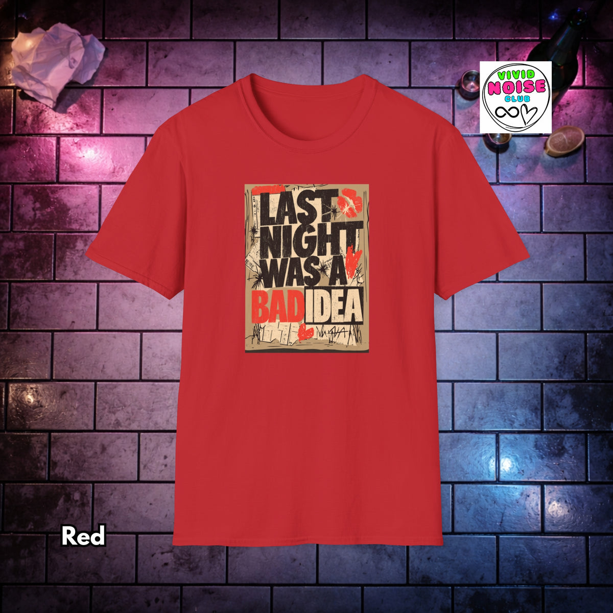 A red short-sleeve t-shirt with a graphic print on the front that reads 'LAST NIGHT WAS A BAD IDEA' in black and red text over a distressed beige background. The shirt is displayed against a dark brick wall background with purple and blue lighting, with a 'Vivid Noise Club' sticker overlay in the top right and the word 'Red' in the bottom left.