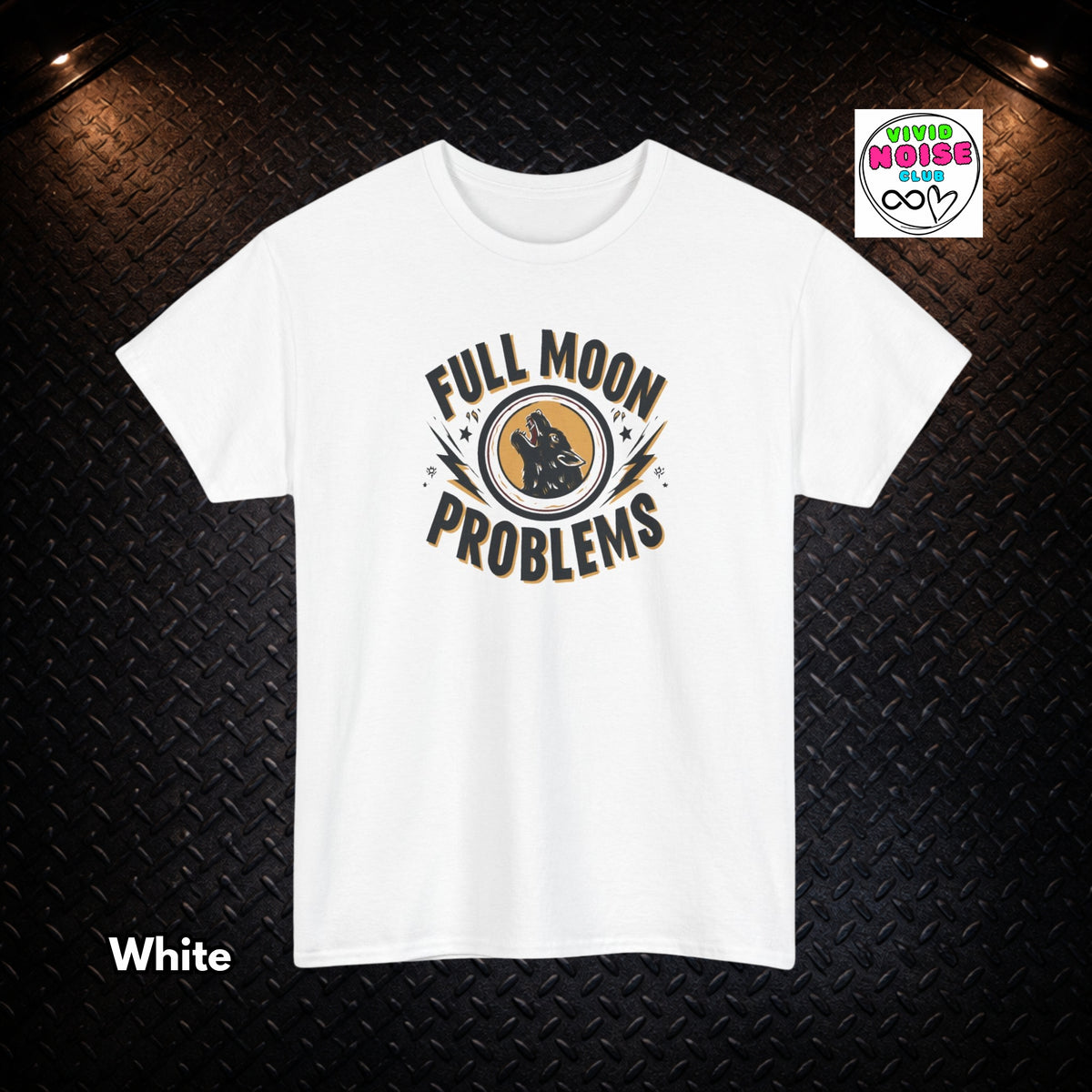A white short-sleeve t-shirt with a graphic print reading 'FULL MOON PROBLEMS' around a moon silhouette, displayed on a black diamond plate background. A 'Vivid Noise Club' logo is visible in the top right, and 'White' is written in the bottom left.