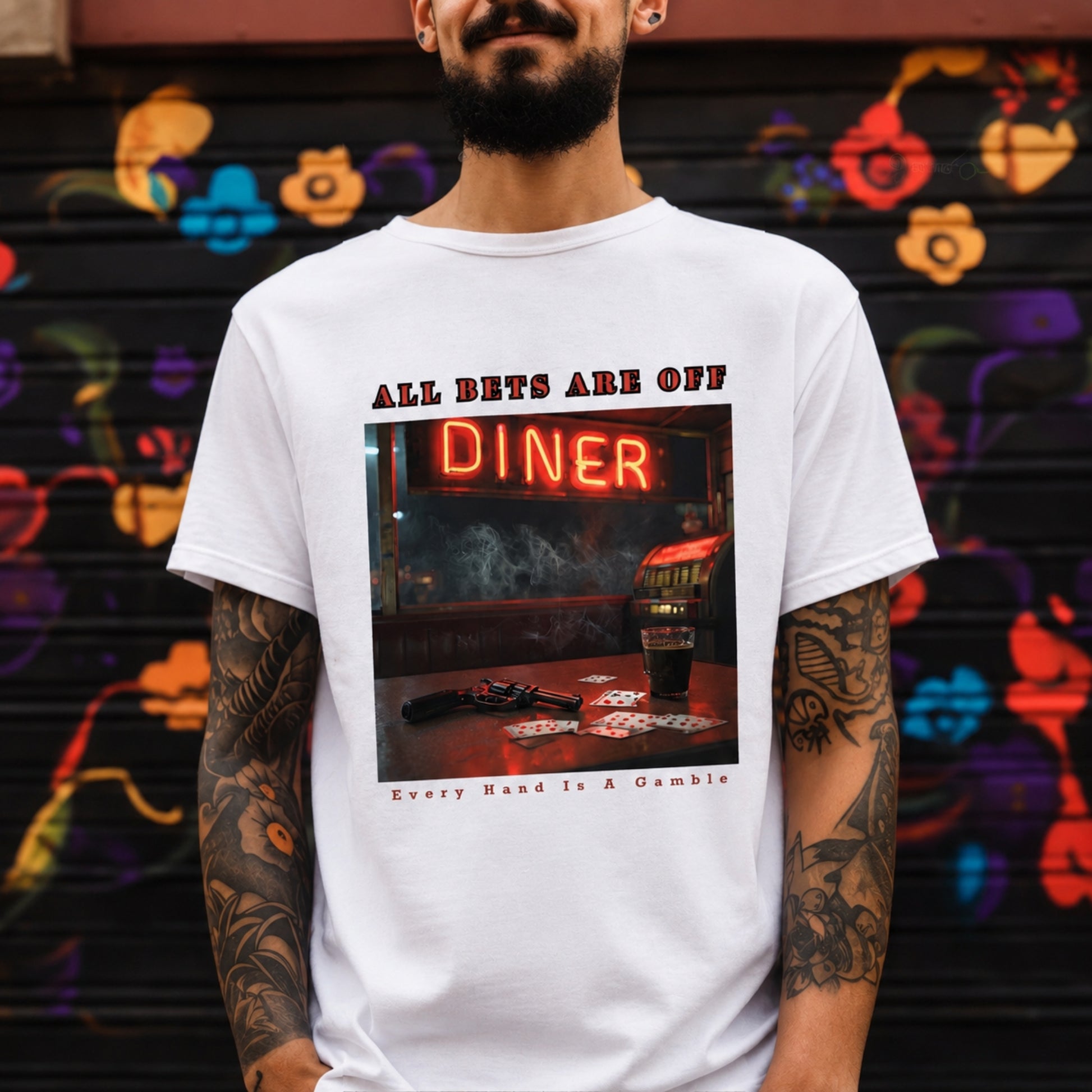 Preview of the All Bets Are Off graphic t-shirt featuring a cinematic neon diner scene with vintage Americana styling, glowing red signage and late-night film-noir atmosphere.